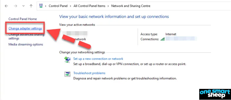 Windows Network and Sharing Centre with a red arrow pointing to the Change adapter settings link, outlined in red