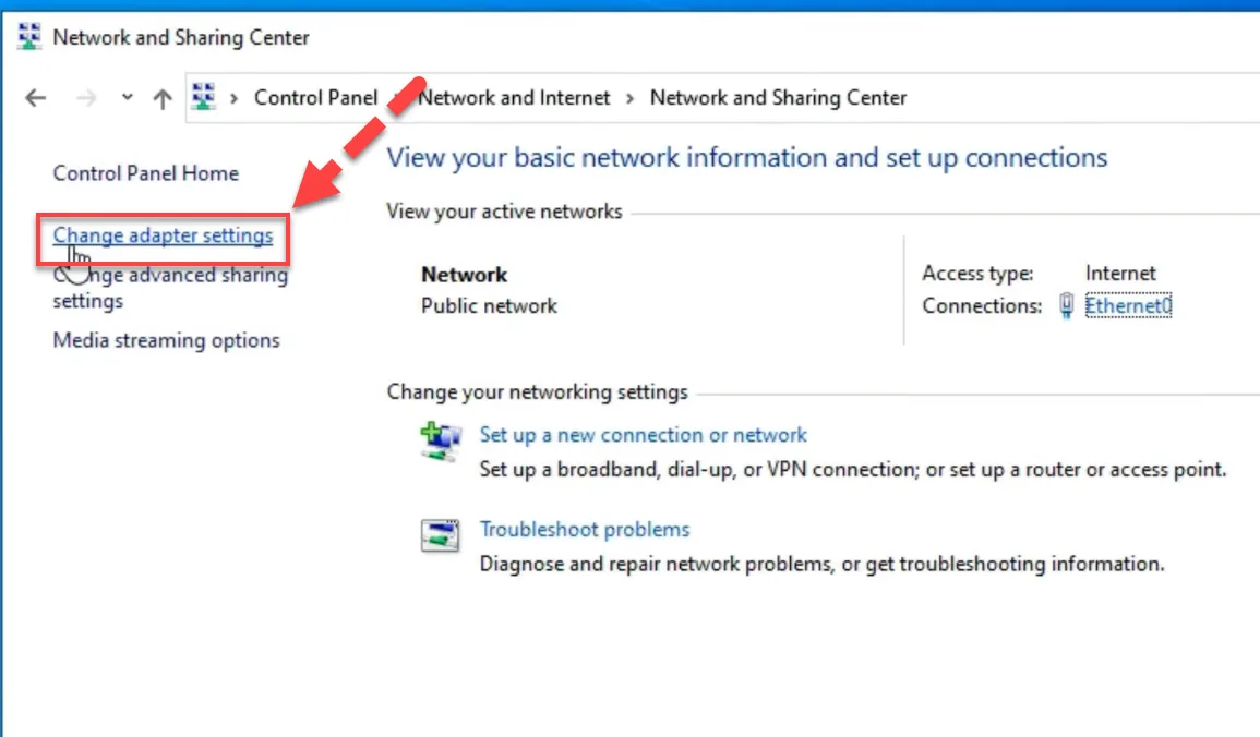 Windows Network and Sharing Center with a red arrow pointing to the Change adapter settings link in the sidebar