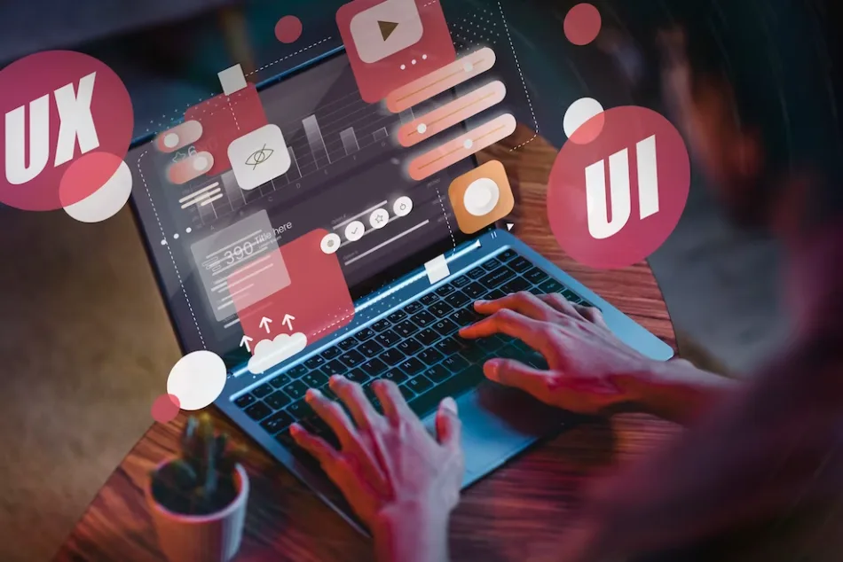 Hands typing on a laptop with UX and UI badges and interface elements floating above the screen