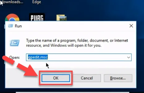 Windows Run dialog with gpedit.msc typed in the Open field and a red arrow pointing to the OK button