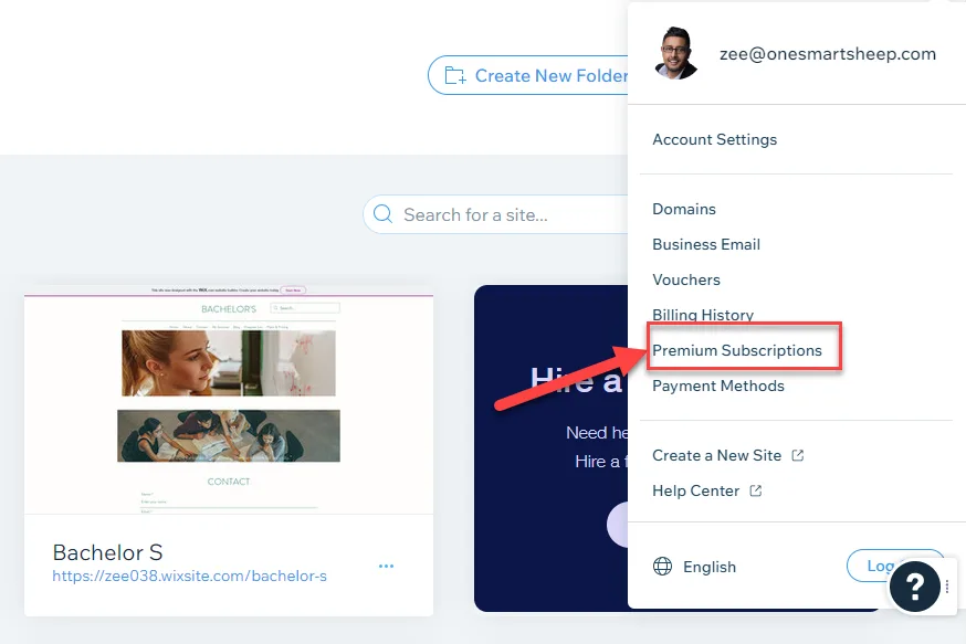 Wix account menu with a red arrow pointing to Premium Subscriptions, above Payment Methods and Create a New Site