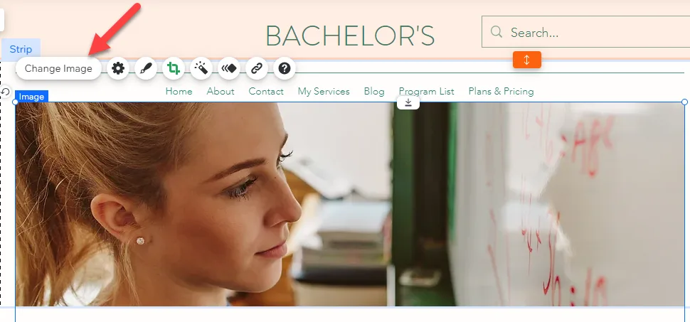 Wix editor with an image selected and a red arrow pointing to the Change Image button in the floating toolbar