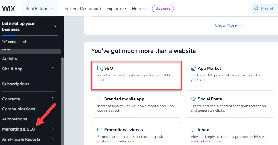 Wix dashboard with a red arrow pointing to Marketing and SEO, the SEO tile outlined in red beside App Market and Social Posts