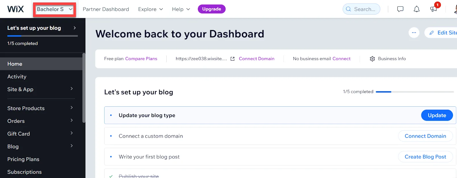 Wix dashboard with the site switcher dropdown outlined in red at the top of the page