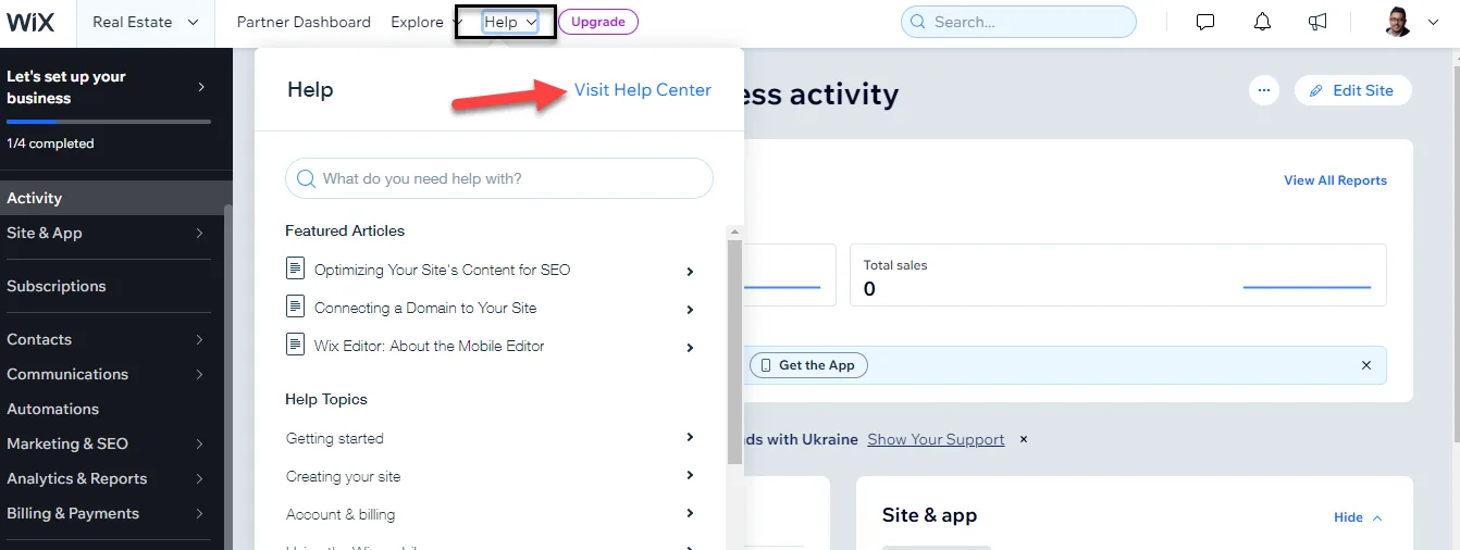 Wix dashboard Help menu open with a red arrow pointing to Visit Help Center, above featured articles and help topics